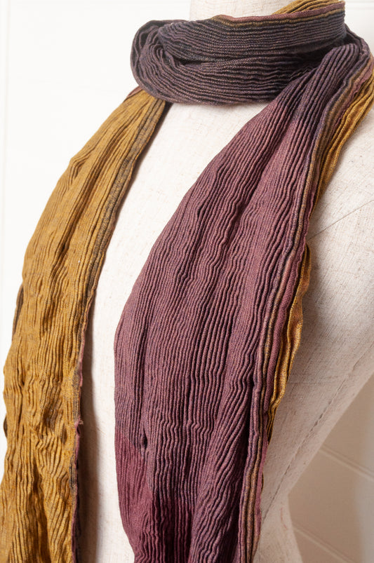 Neeru Kumar pure wool shibori dyed crinkle pleat finish scarf in mustard yellow, ginger brown and dusty lavender.