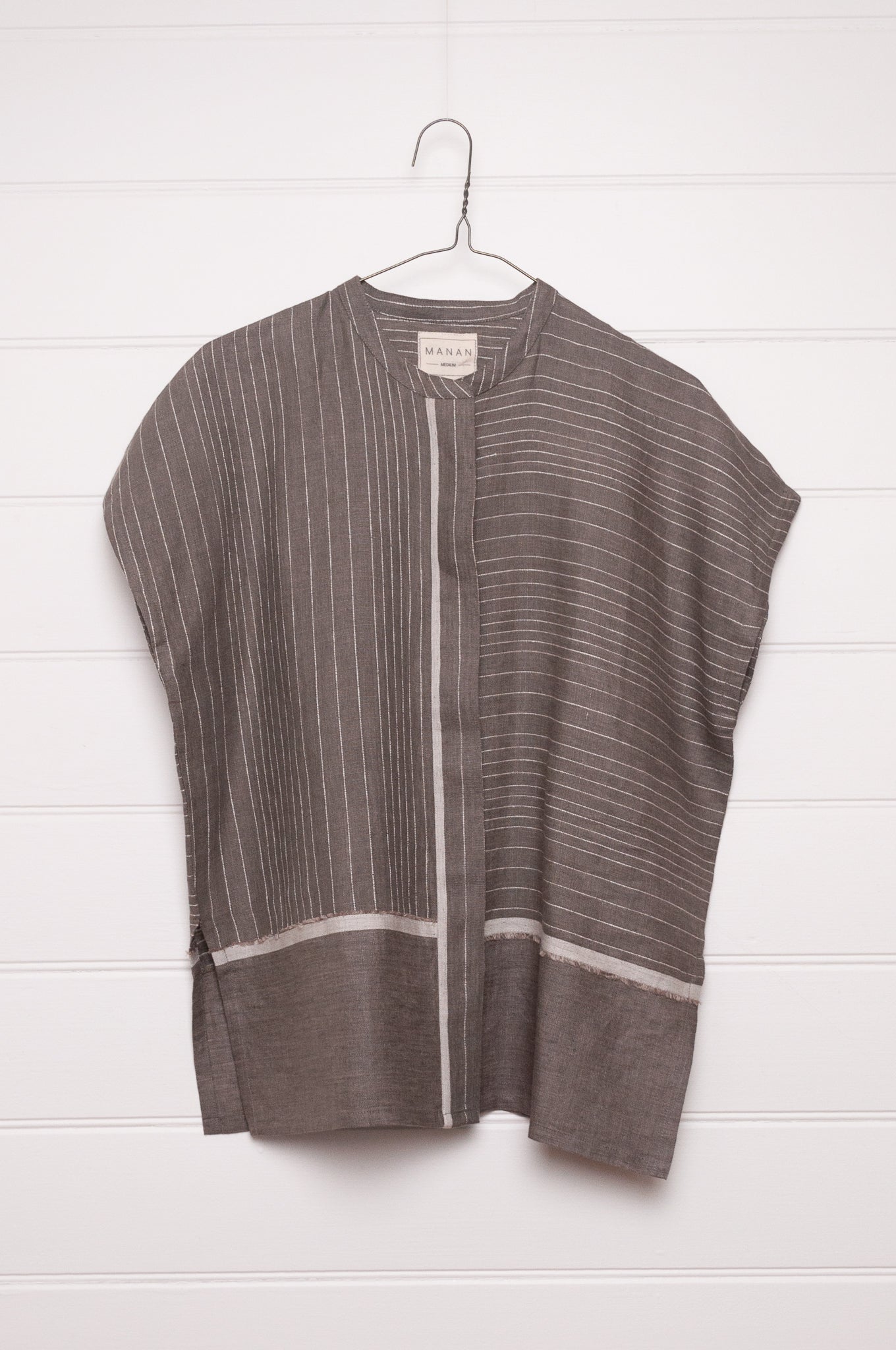 Manan Madhavi button up top in yarn-dyed grey and white stripe linen with panel detailing.