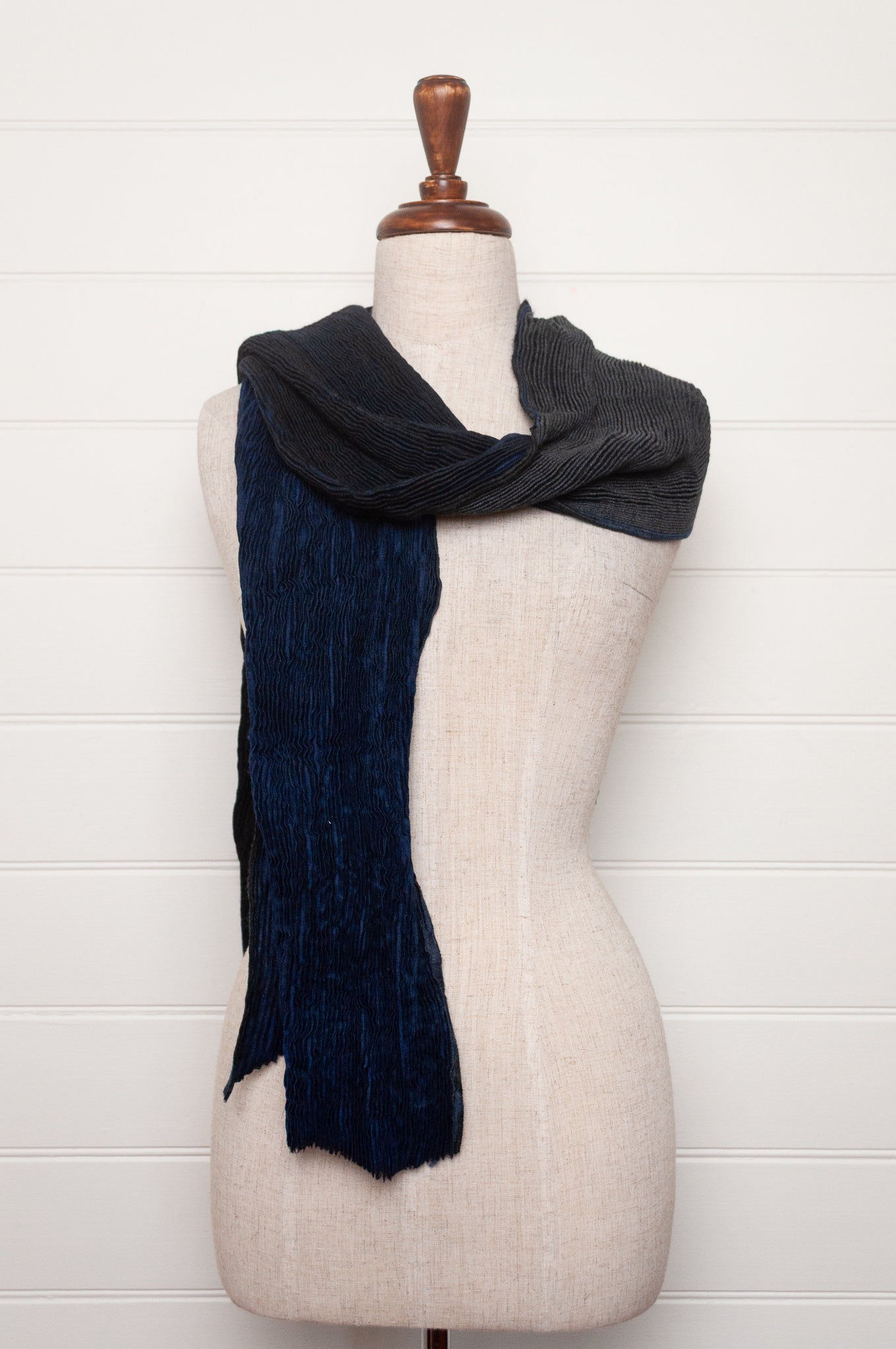 Neeru Kumar pure wool shibori dyed crinkle pleat finish scarf in indigo blue, and charcoal grey.