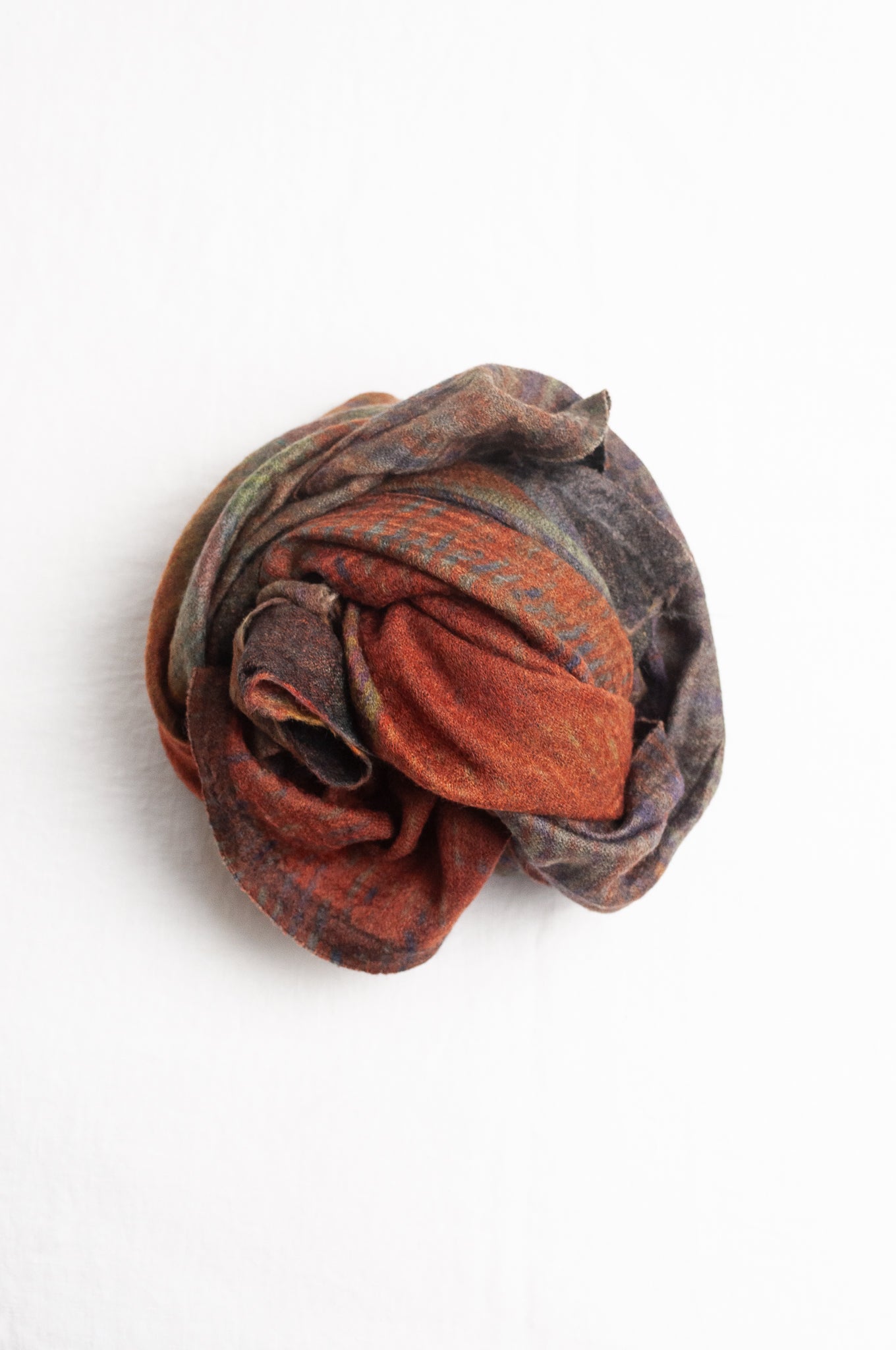Neeru Kumar fine wool scarf digital print in abstract design with tones of rust, blue, charcoal and brown.