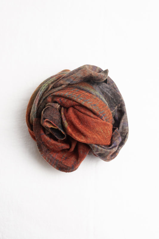Neeru Kumar fine wool scarf digital print in abstract design with tones of rust, blue, charcoal and brown.
