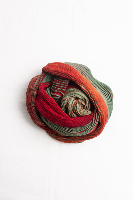 Neeru Kumar pure wool shibori dyed crinkle pleat finish scarf in ruby red and aquamarine blue.