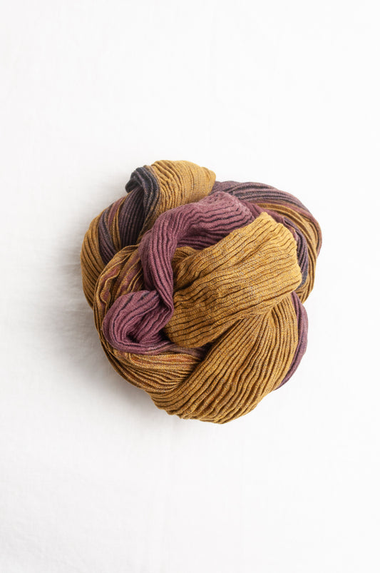 Neeru Kumar pure wool shibori dyed crinkle pleat finish scarf in mustard yellow, ginger brown and dusty lavender.