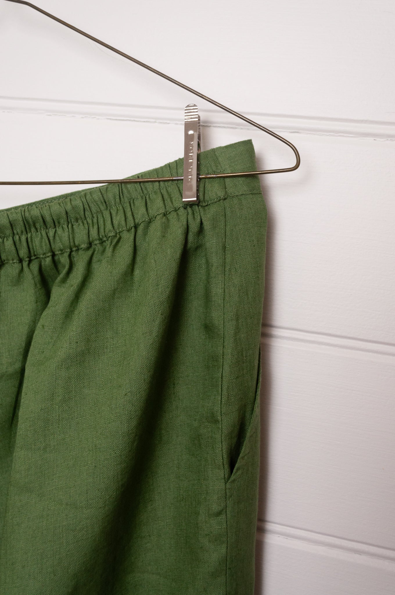 Manan Wera tapered linen pant in green.