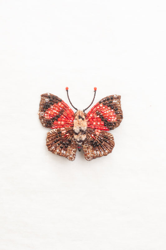Trovelore hand beaded Scarlet leafwing butterfly, handcrafted butterfly-shaped brooch  red and black patterned wings with a textured brown body.