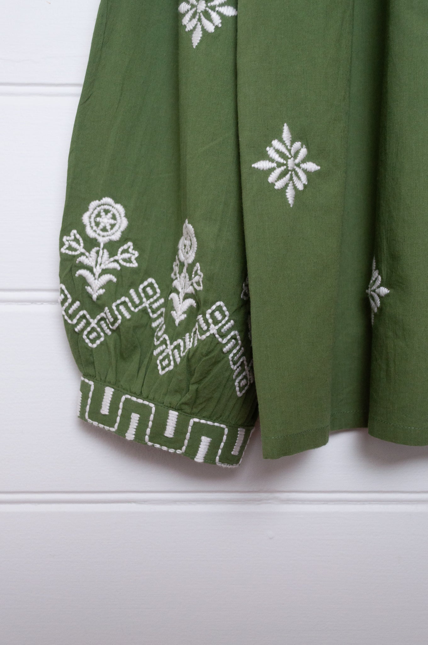Manan Folk blouse, pure cotton button up with ivory embroidery on green.