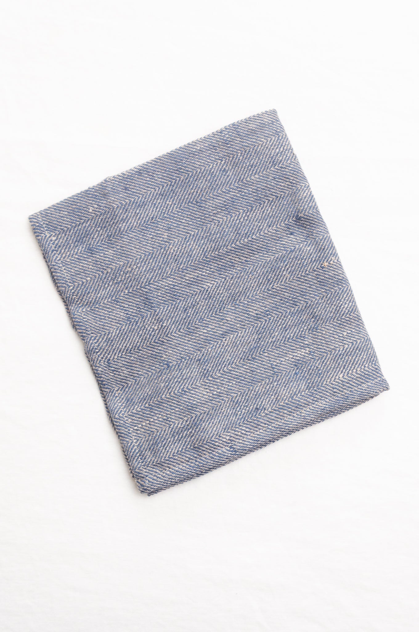 Made in Lithuania pure linen chevron weave tea towel in indigo blue and white.