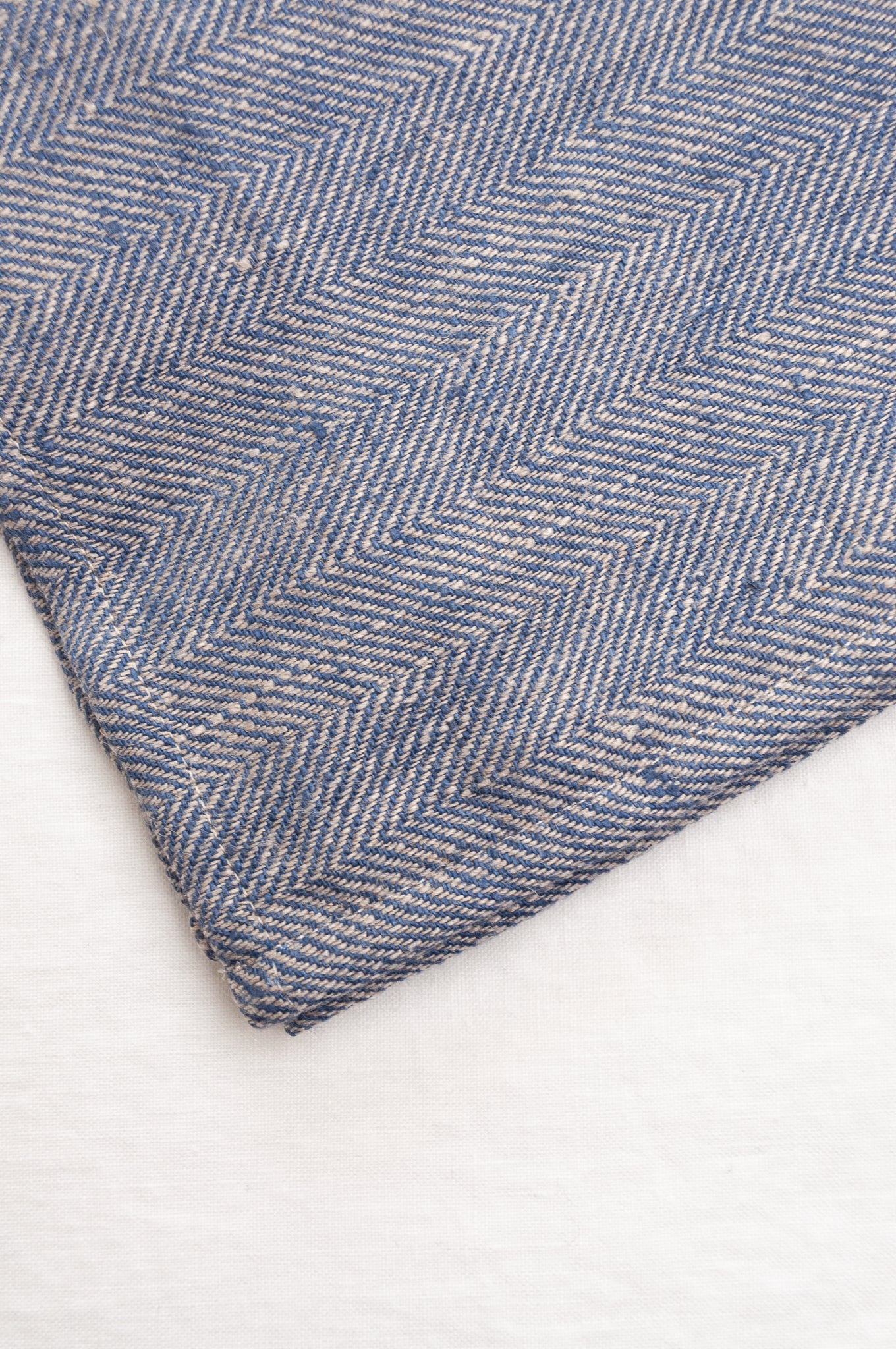Made in Lithuania pure linen chevron weave tea towel in indigo blue and white.