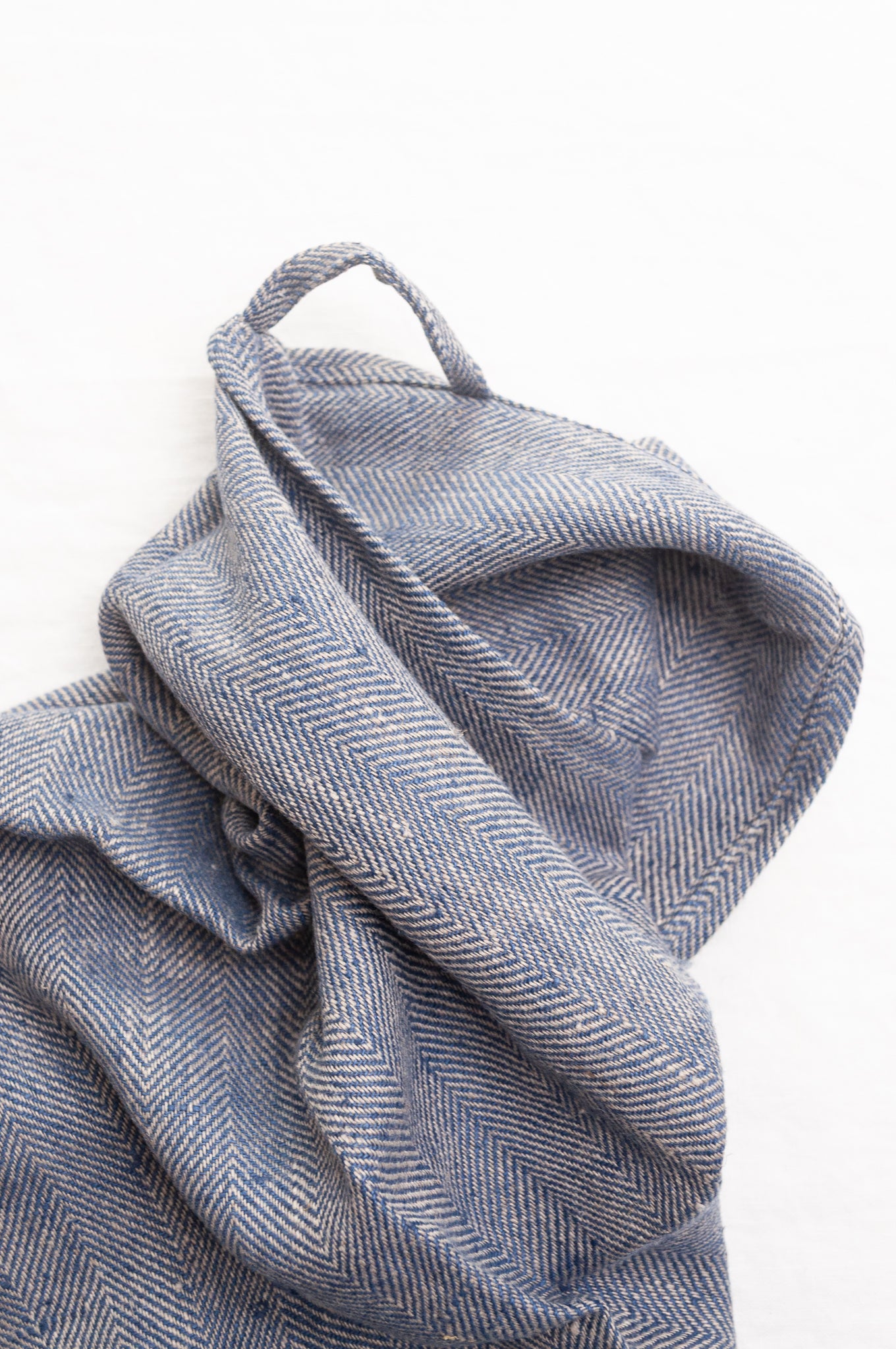 Made in Lithuania pure linen chevron weave tea towel in indigo blue and white.