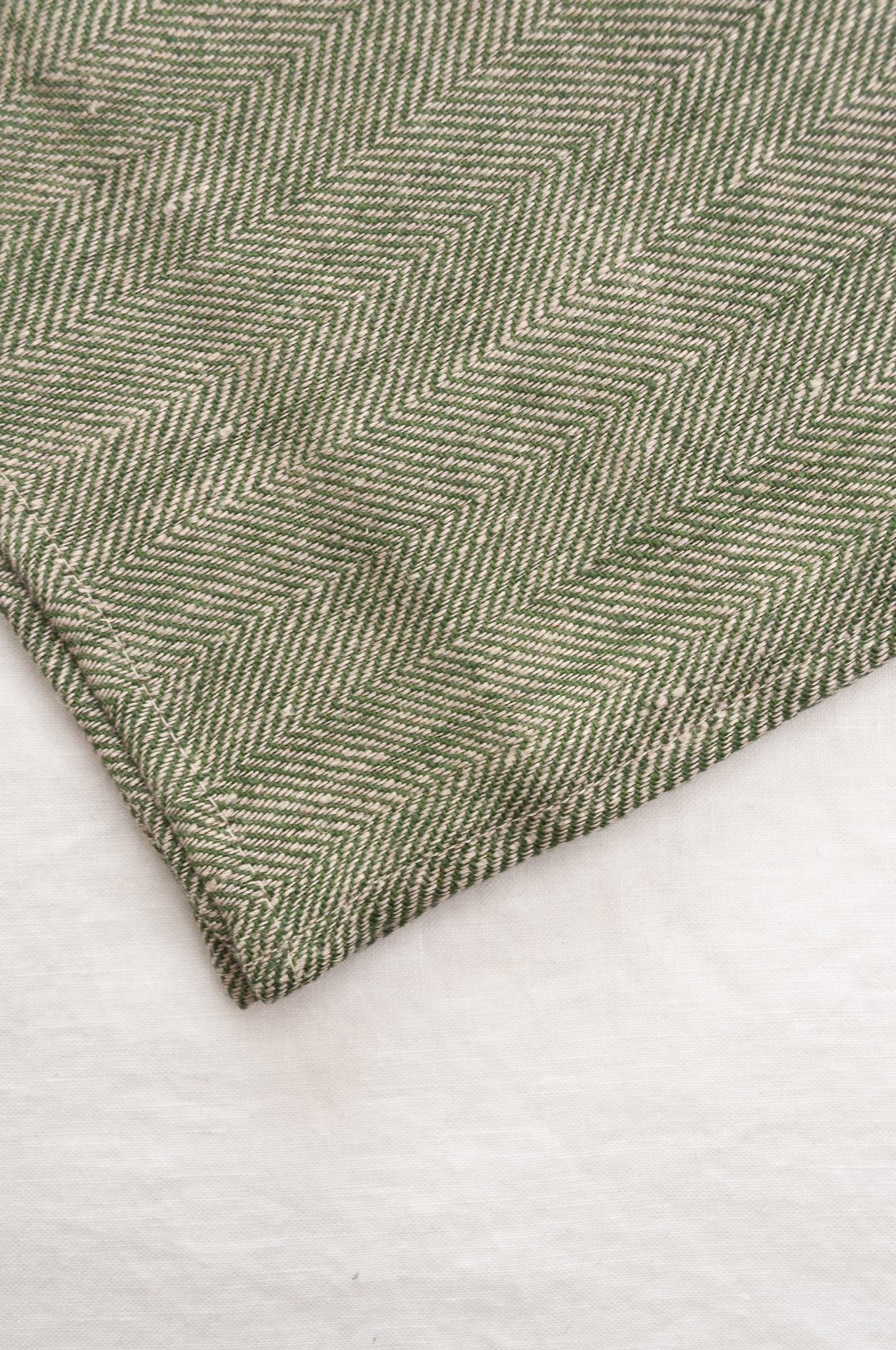 Made in Lithuania pure linen chevron weave tea towel in olive green and white.