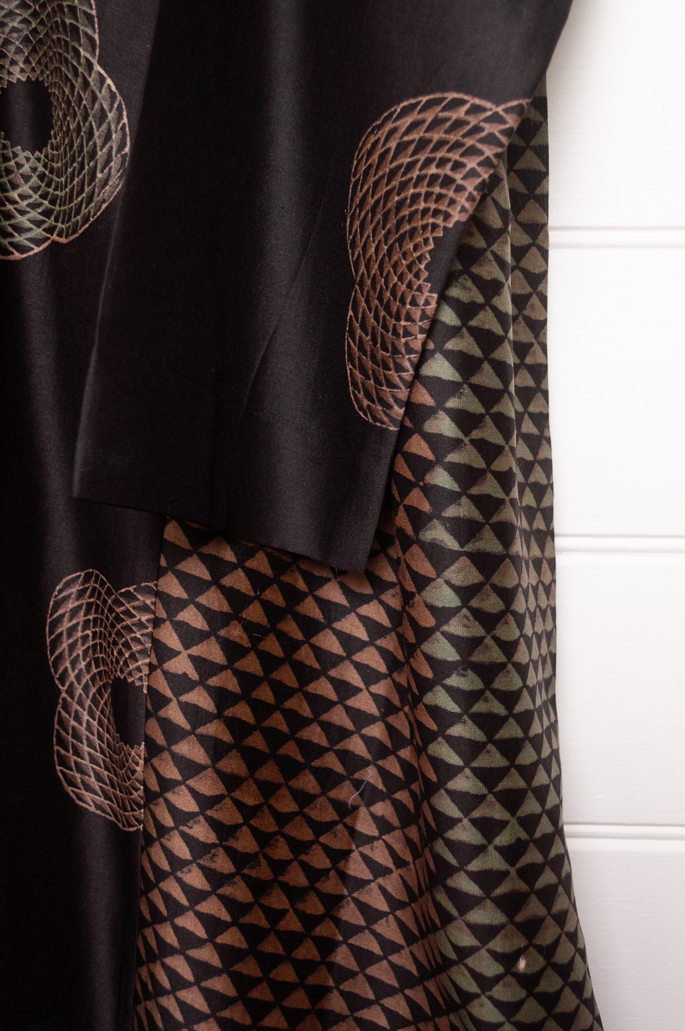 Brahma Karma chanderi cotton silk ebony tunic dress with bronze flowers and geometric side panels.