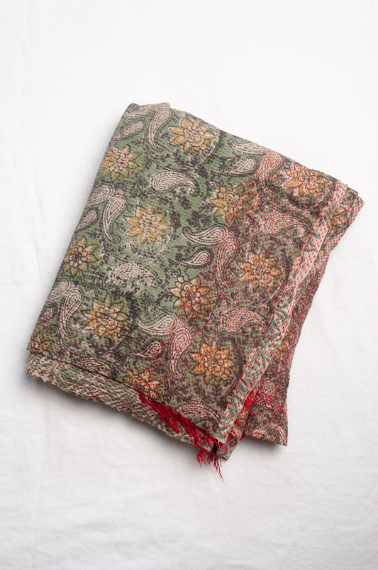 Vintage kantha quilt Bagru blockprinted in sage green, floral design with red braid edging embroidery.