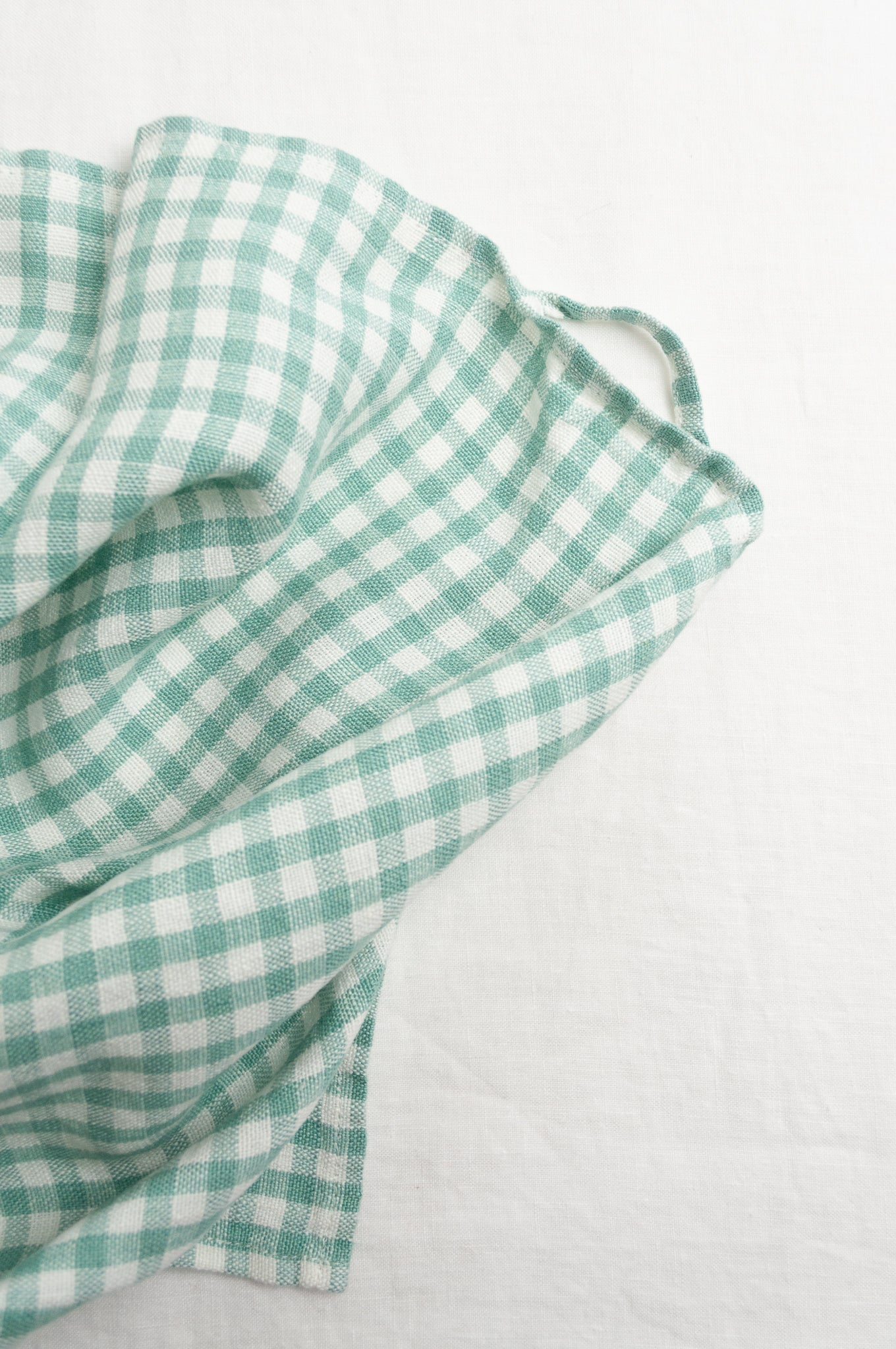 Lithuanian linen gingham mint green and white check tea towel.