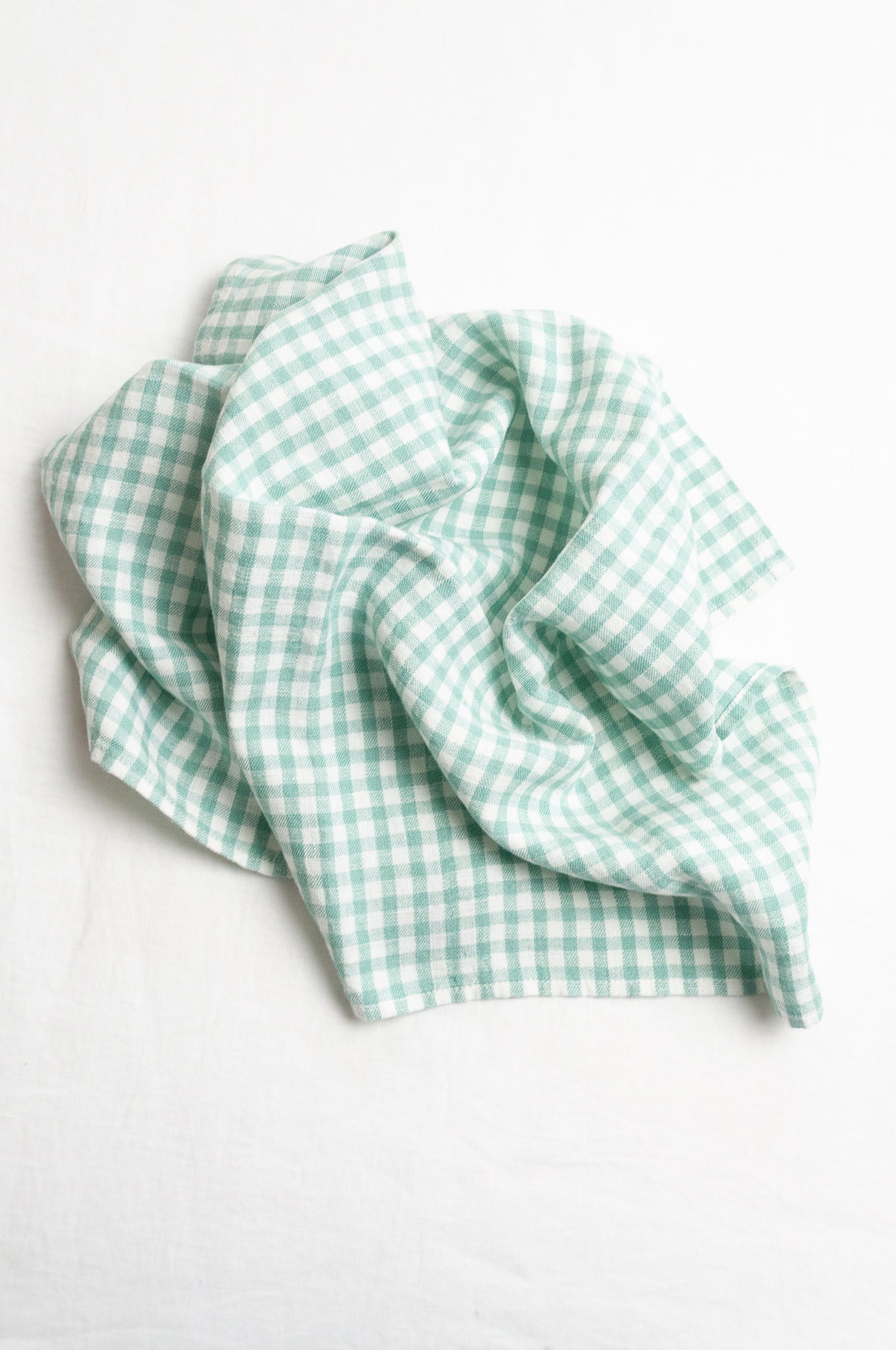 Lithuanian linen gingham mint green and white check tea towel.