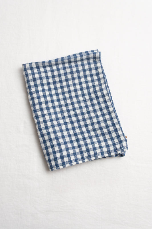 Made in Lithuania pure linen gingham tea towel in indigo blue and white.