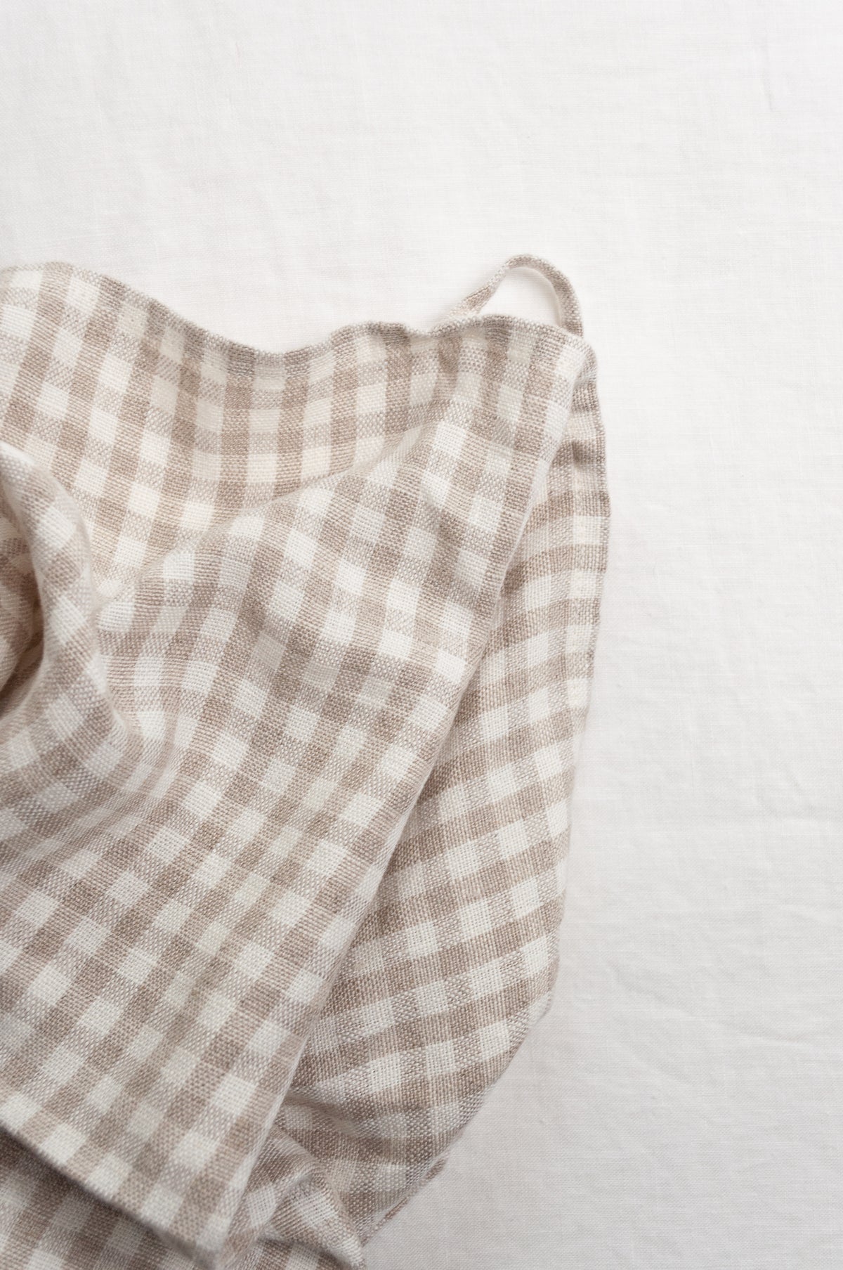 Made in Lithuania pure linen gingham tea towel in natural and white.