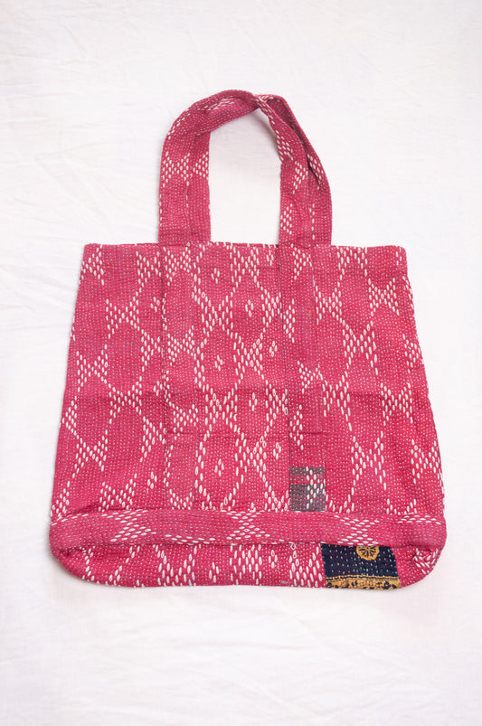 Vintage embroidered kantha quilt market tote bag in raspberry red.