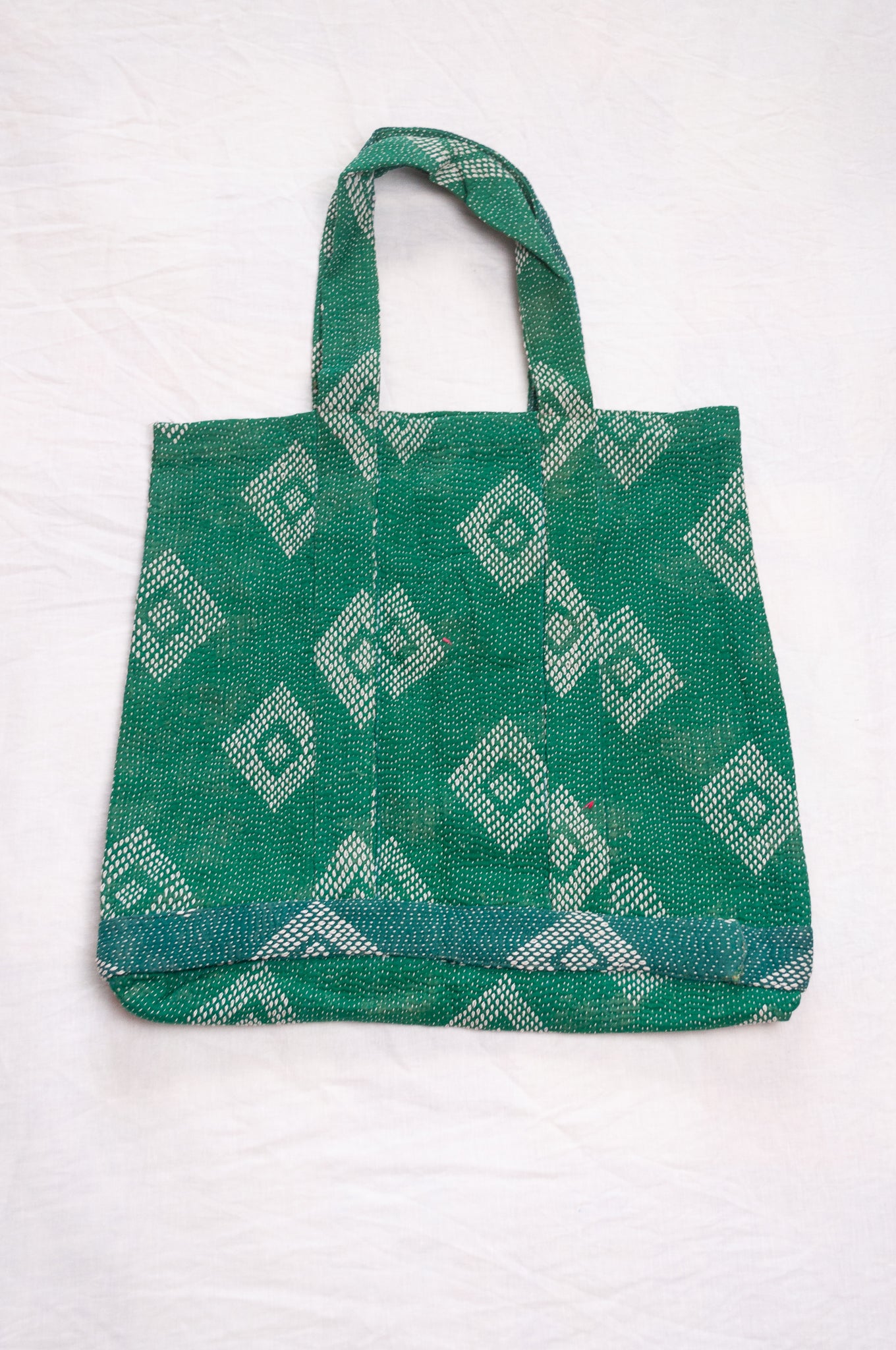 Vintage embroidered kantha quilt market tote bag in emerald green.