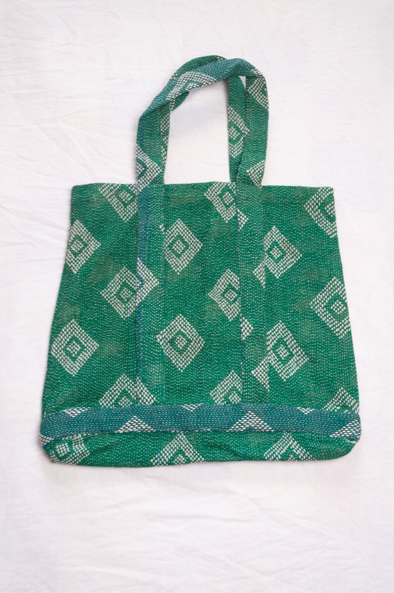 Vintage embroidered kantha quilt market tote bag in emerald green.