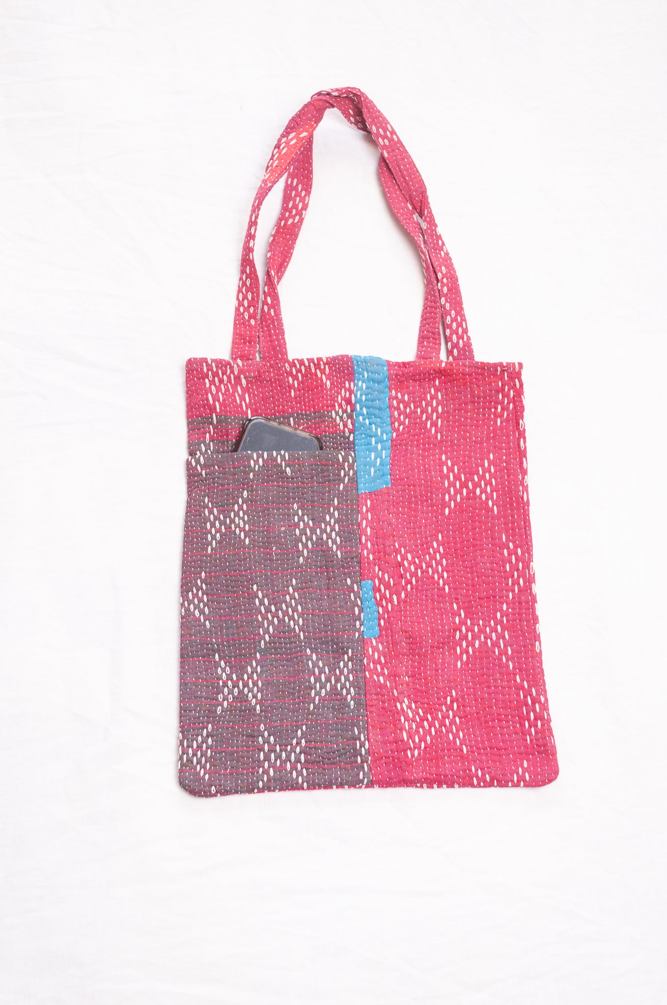 Vintage embroidered kantha quilt tote bag in raspberry red.