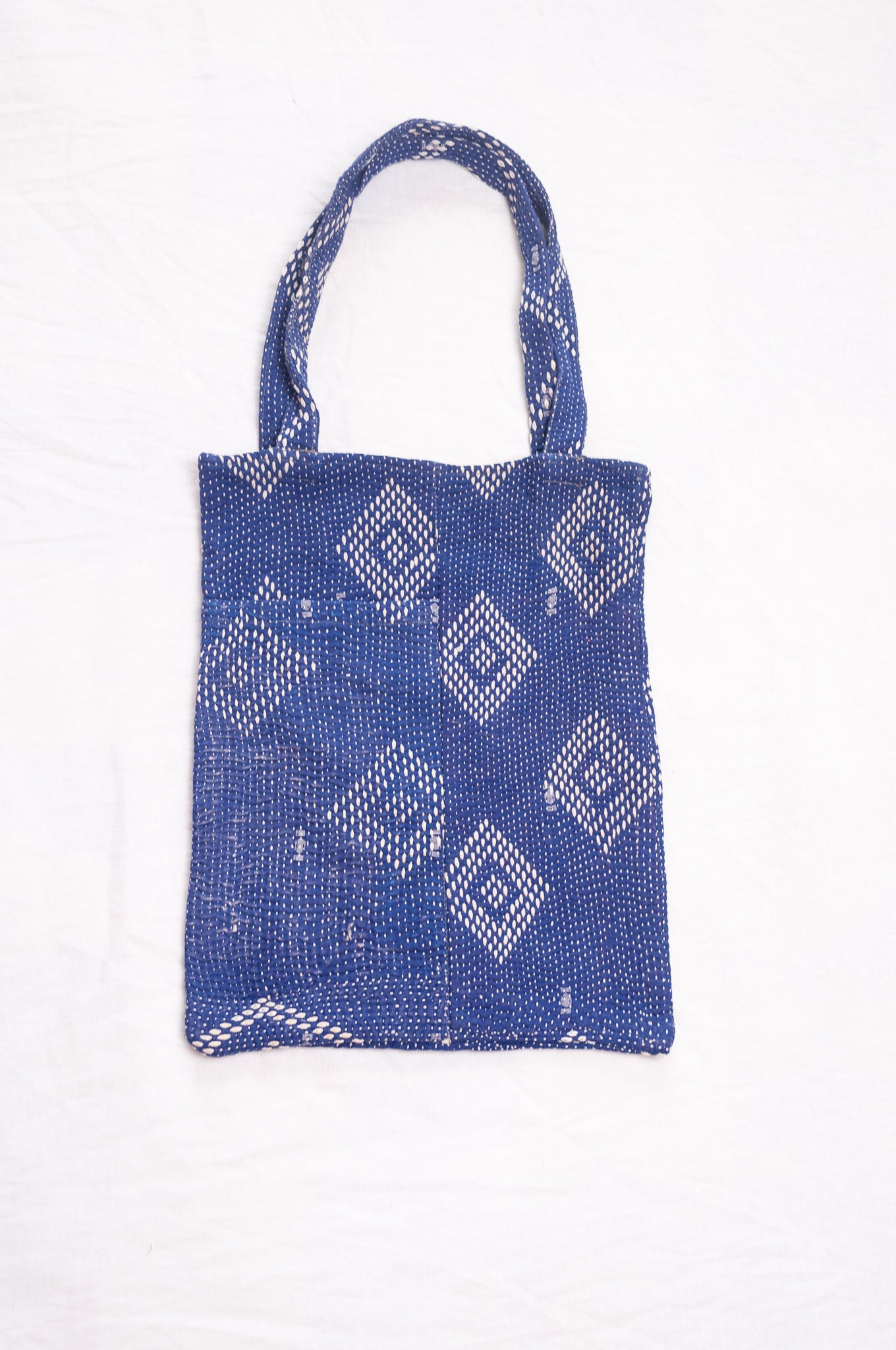 Vintage embroidered kantha quilt tote bag in sapphire blue.