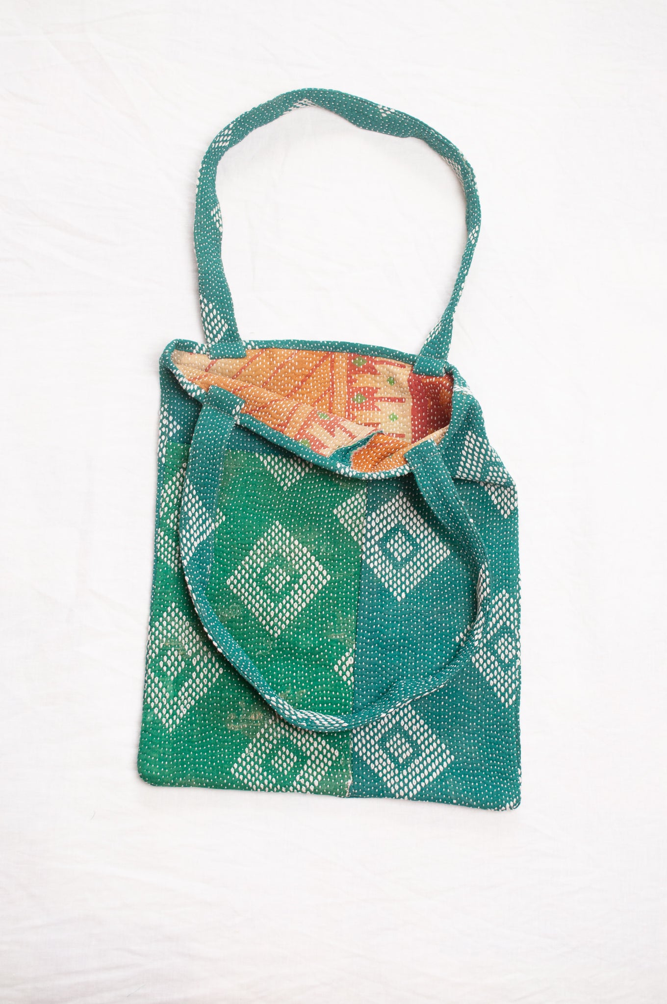 Vintage embroidered kantha quilt tote bag in emerald green.