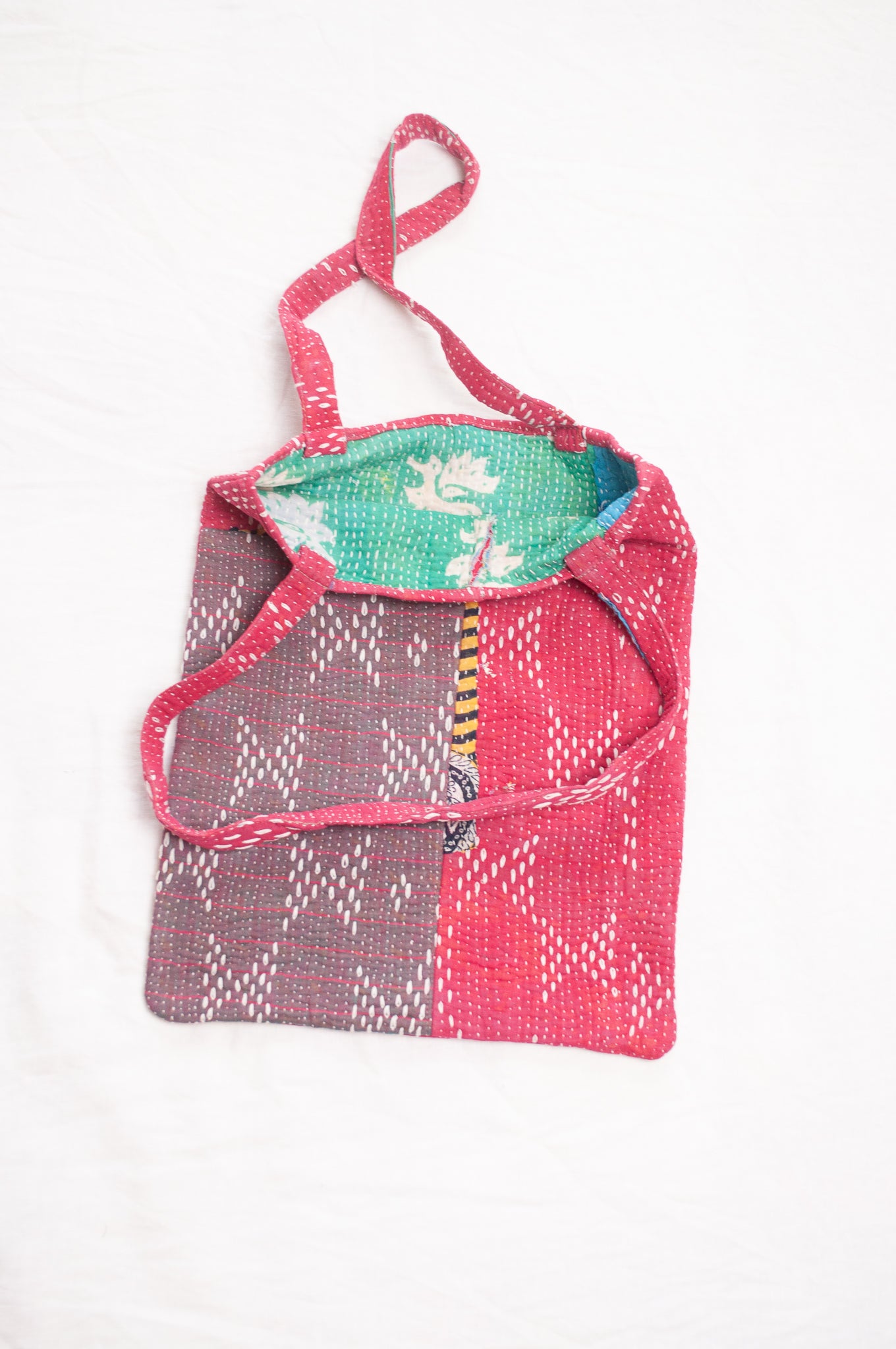 Vintage embroidered kantha quilt tote bag in raspberry red.