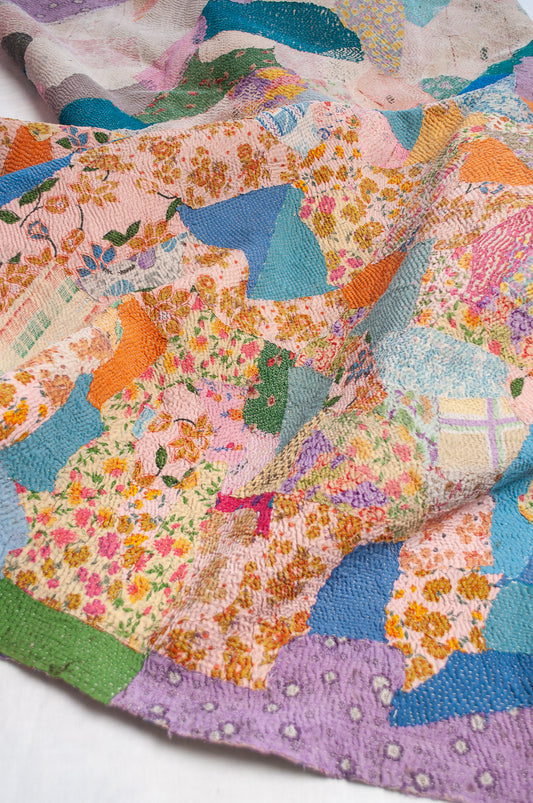 Crazy patchwork kantha quilt in retro prints and plains.