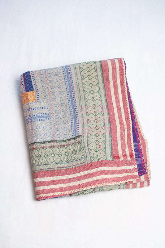 Multi striped coloured vintage kantha quilt.