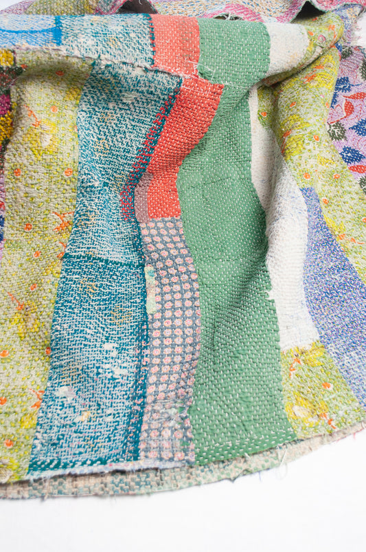 Vintage patchwork kantha quilt, multi colour with floral prints.