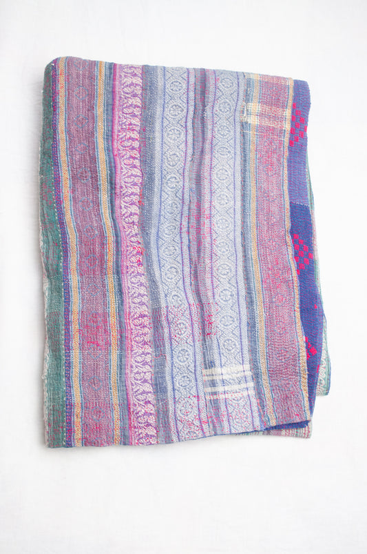 Striped vintage kantha quilt in mauve and green.
