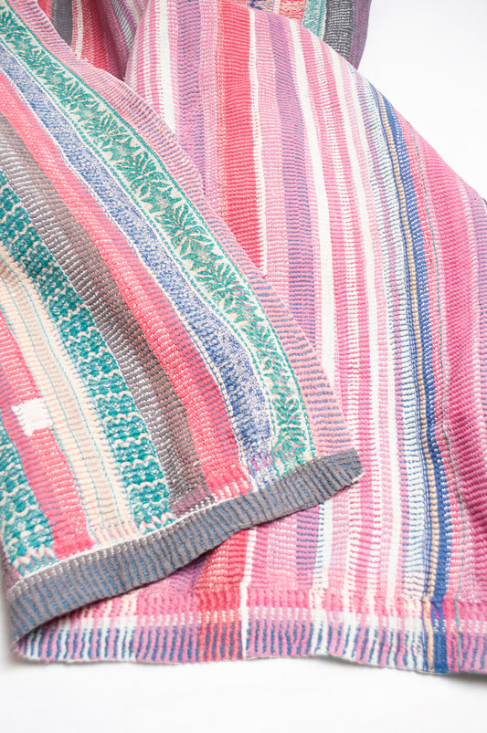 Striped vintage kantha in pink, white, green and blue.