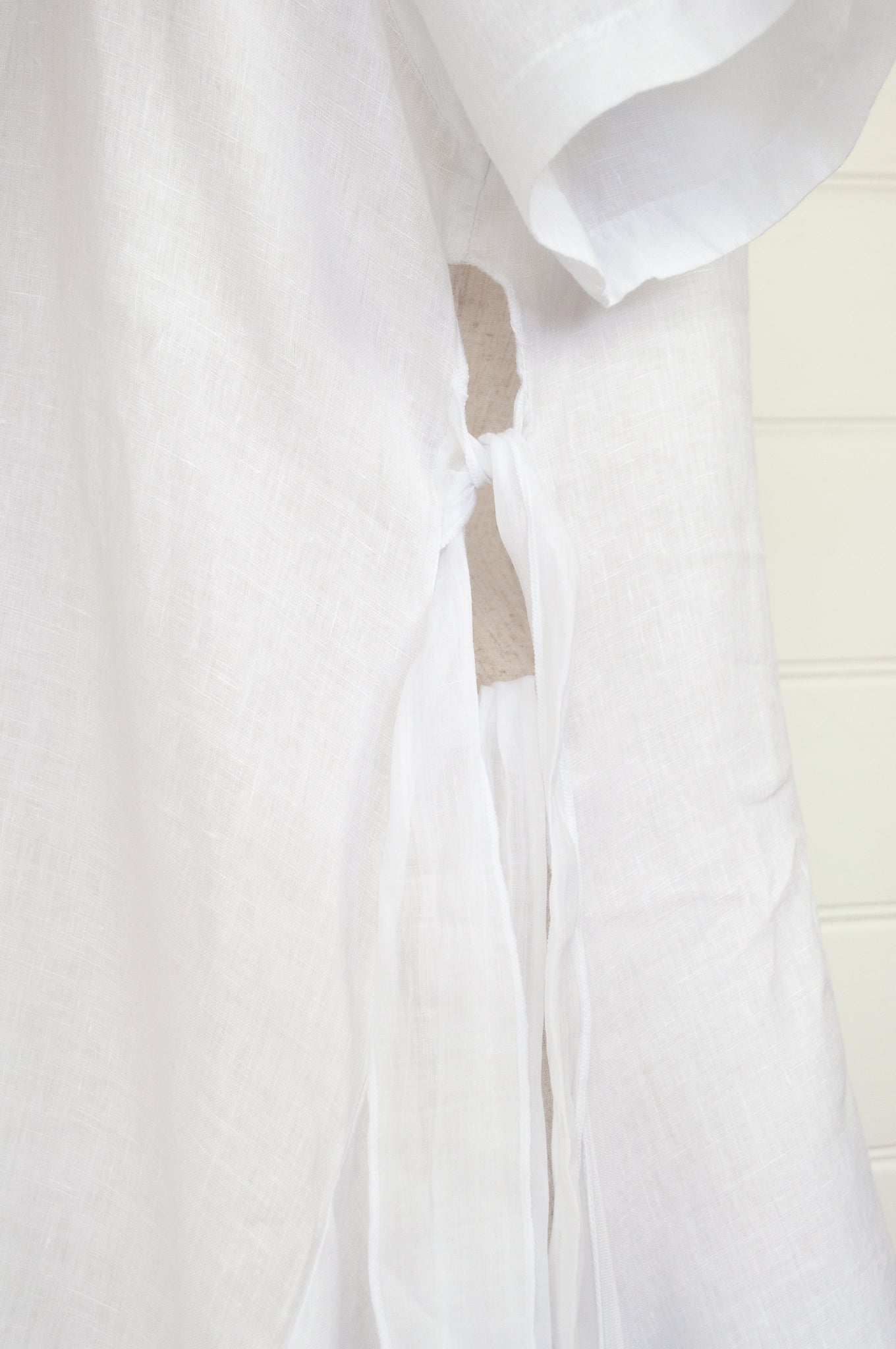 Banana Blue white linen tunic with side ties.