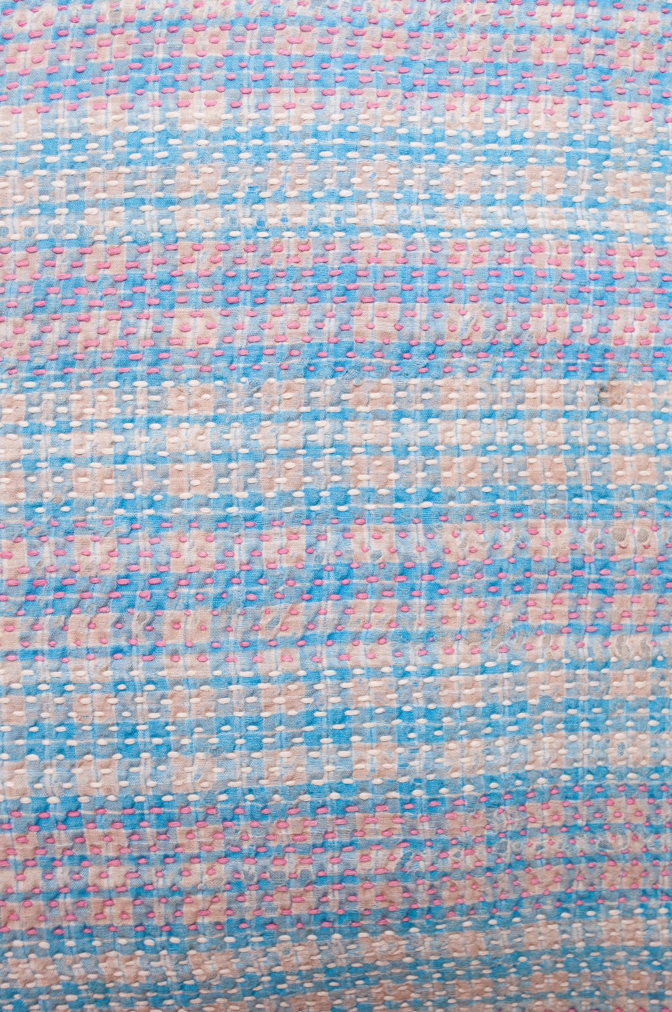 Vintage kantha quilt cushion in blue and lavender plaid.