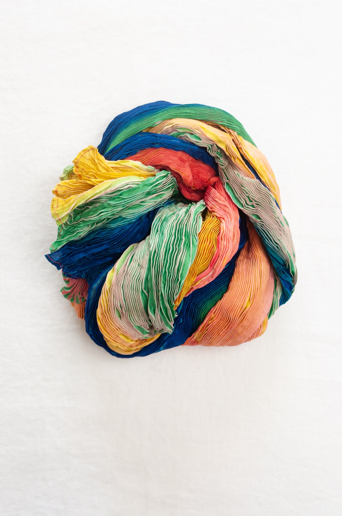 Neeru Kumar shibori dyed pure silk crinkle scarf in rainbow colours.