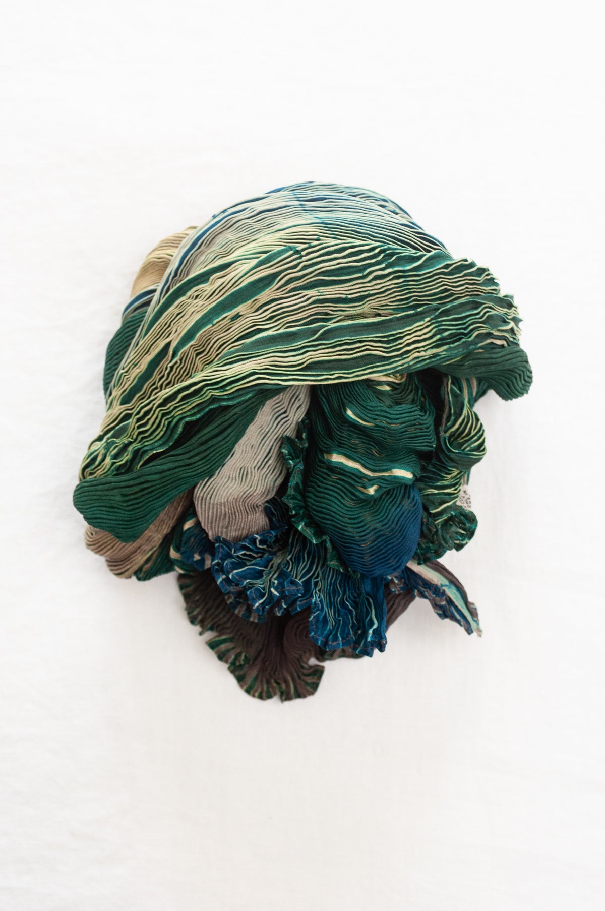 Neeru Kumar shibori dyed pure silk crinkle scarf in emerald green and coffee brown.