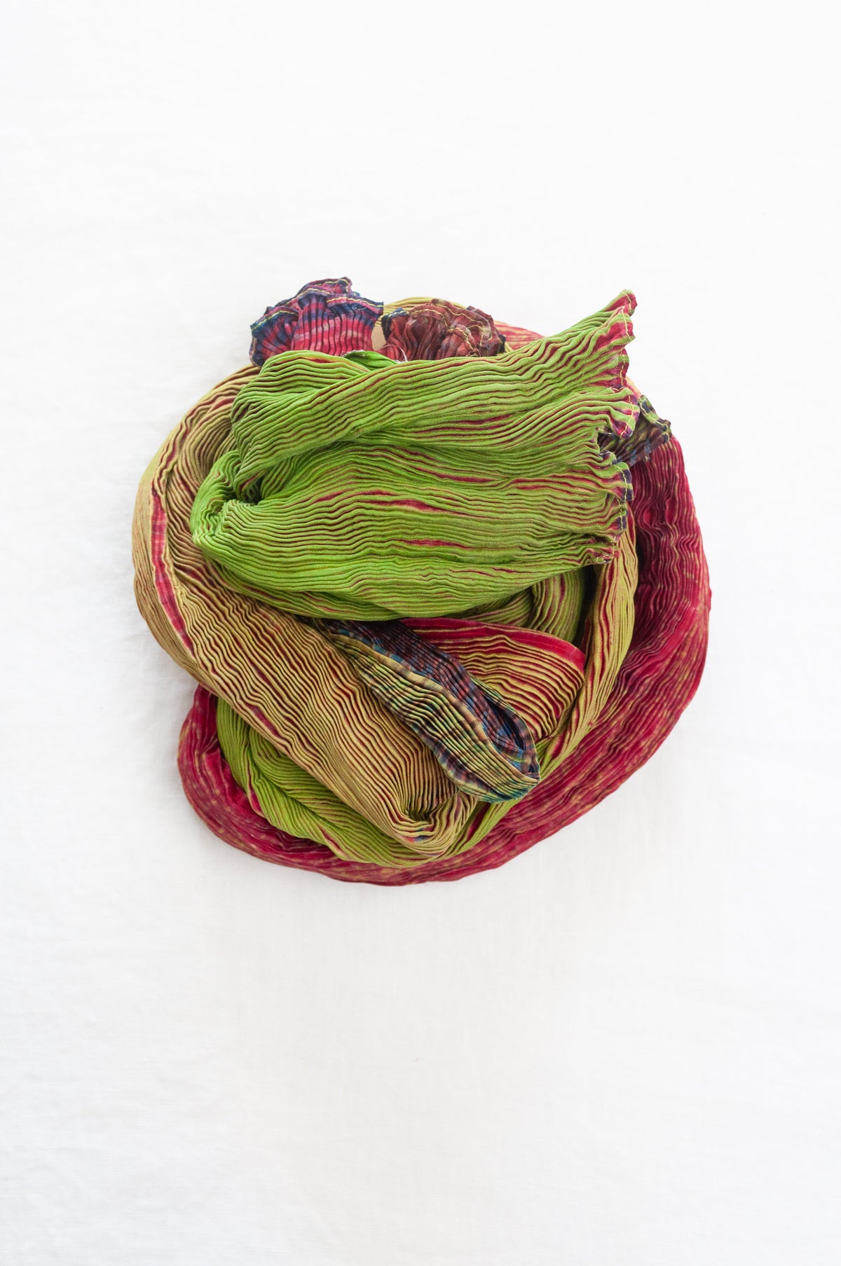 Neeru Kumar shibori dyed pure silk crinkle scarf in lime green and raspberry pink.