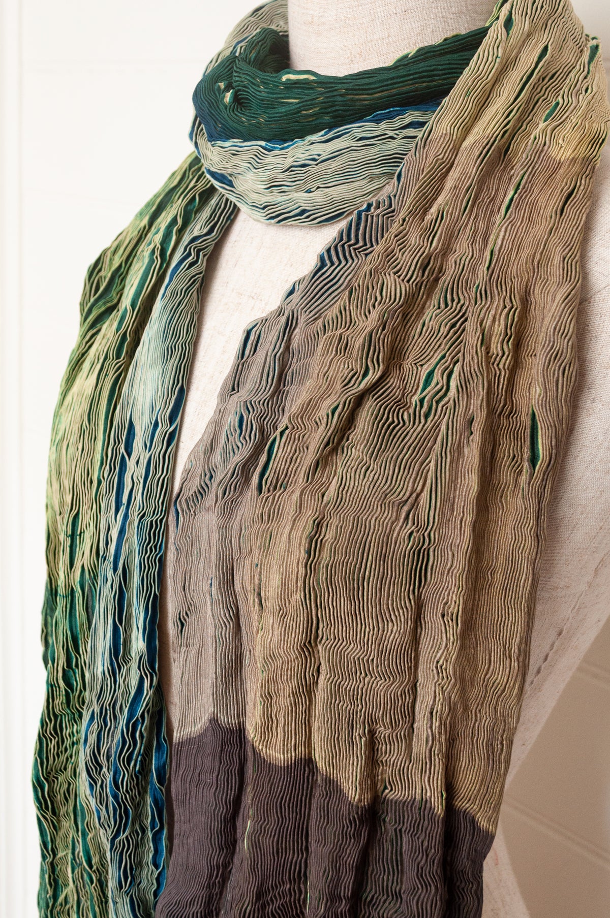 Neeru Kumar shibori dyed pure silk crinkle scarf in emerald green and coffee brown.
