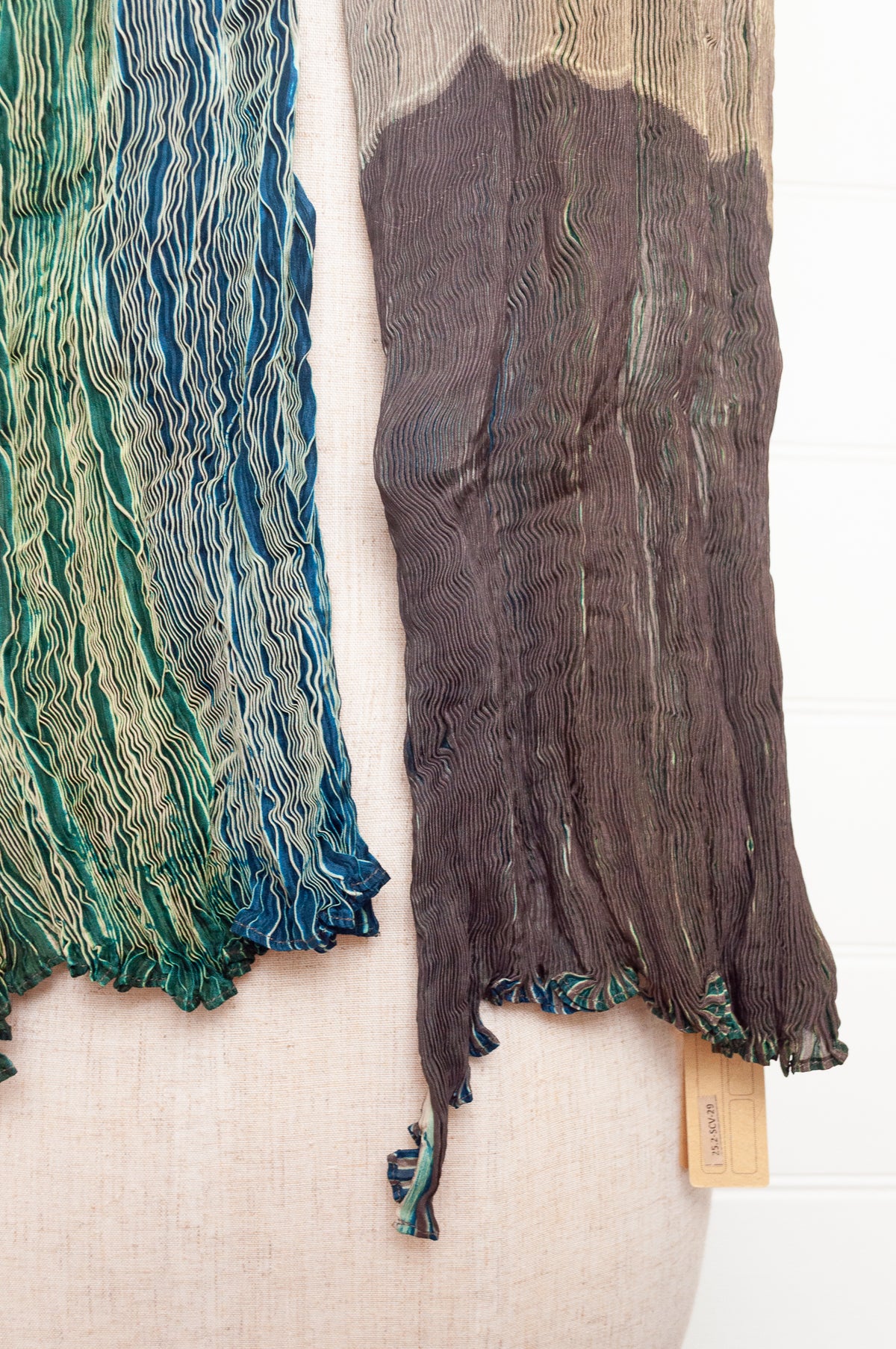 Neeru Kumar shibori dyed pure silk crinkle scarf in emerald green and coffee brown.