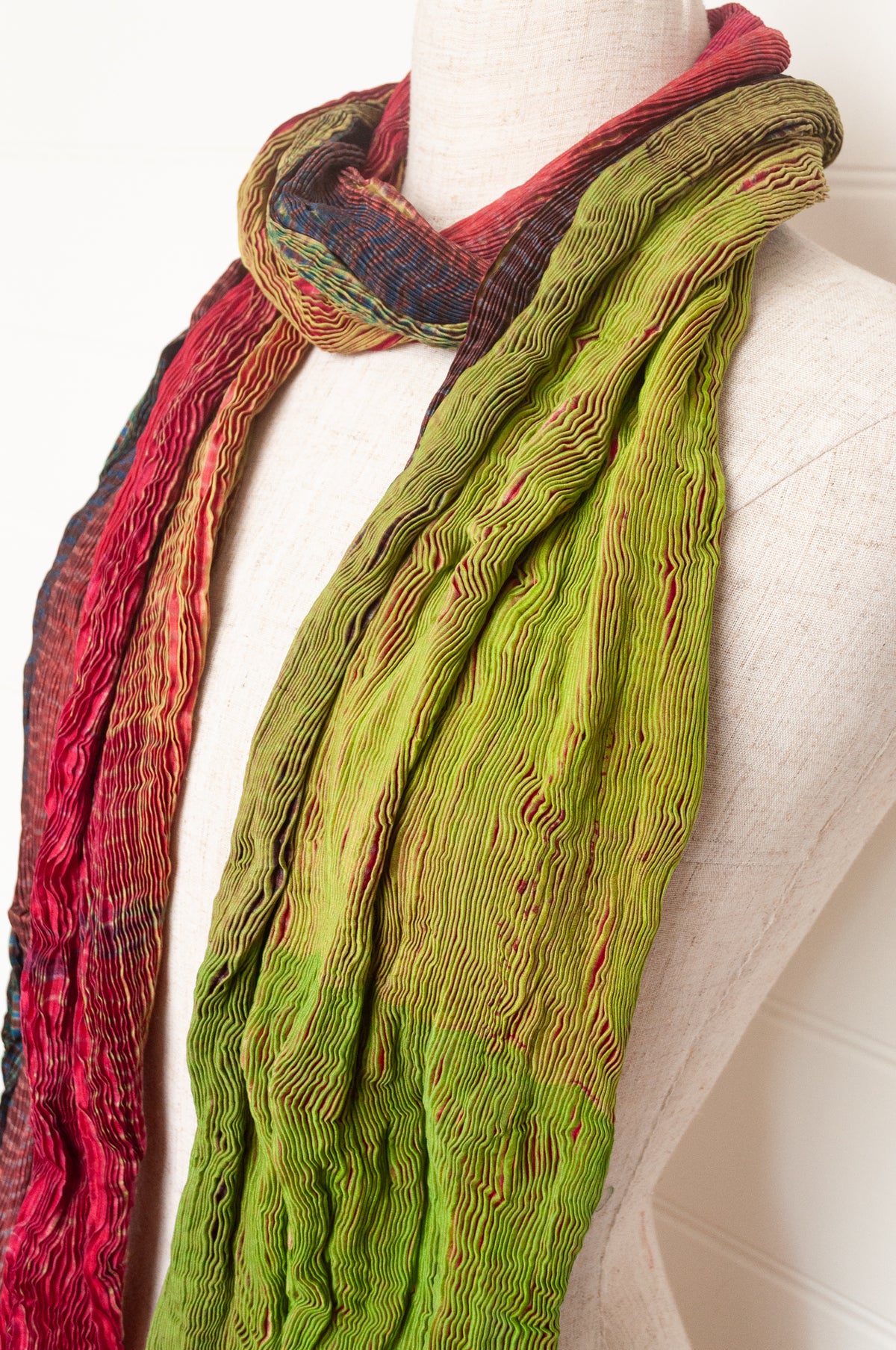 Neeru Kumar shibori dyed pure silk crinkle scarf in lime green and raspberry pink.