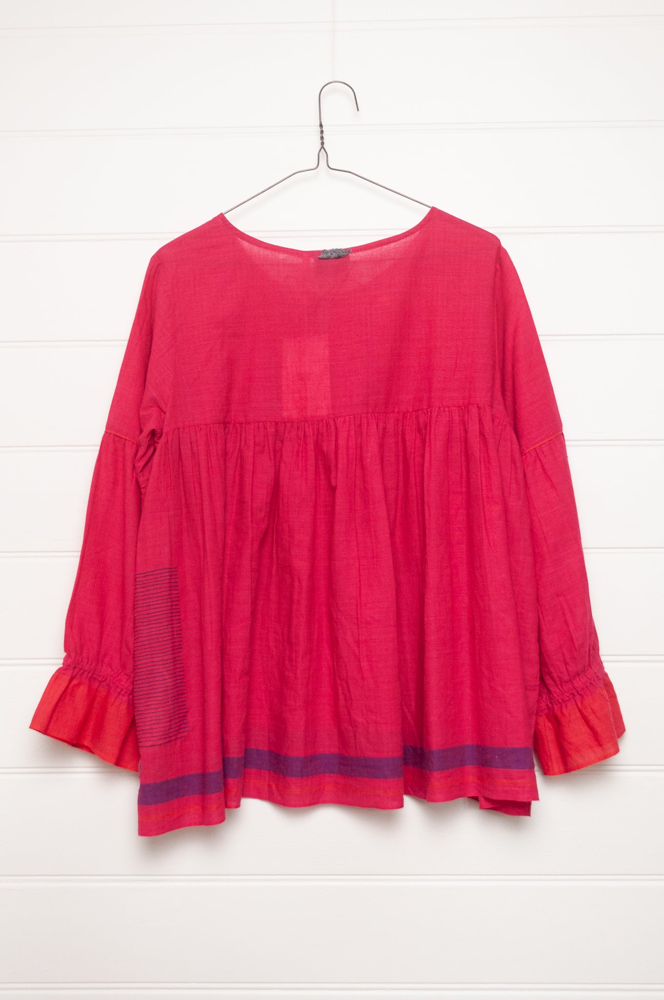 Lotus Veda Victoria blouse in handloom cotton bright raspberry pink red.