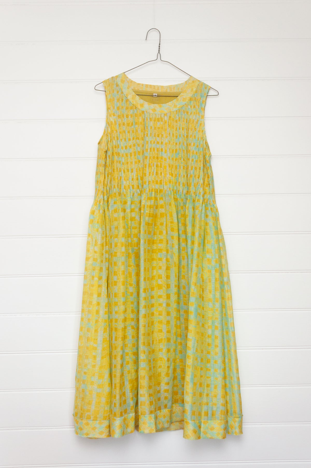 Neeru Kumar fine cotton silk pintucked sleeveless sundress in lime yellow with aqua check.
