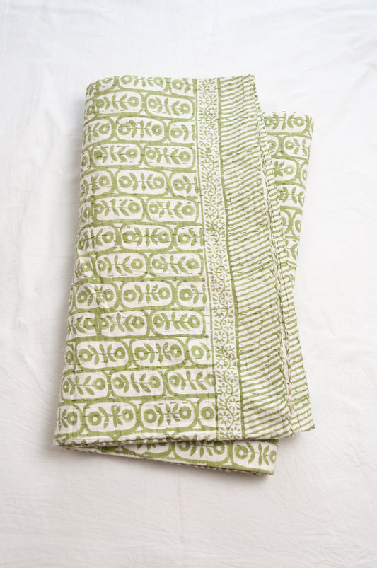 Kantha quilt blockprint pure cotton in floral sage green on white pattern.