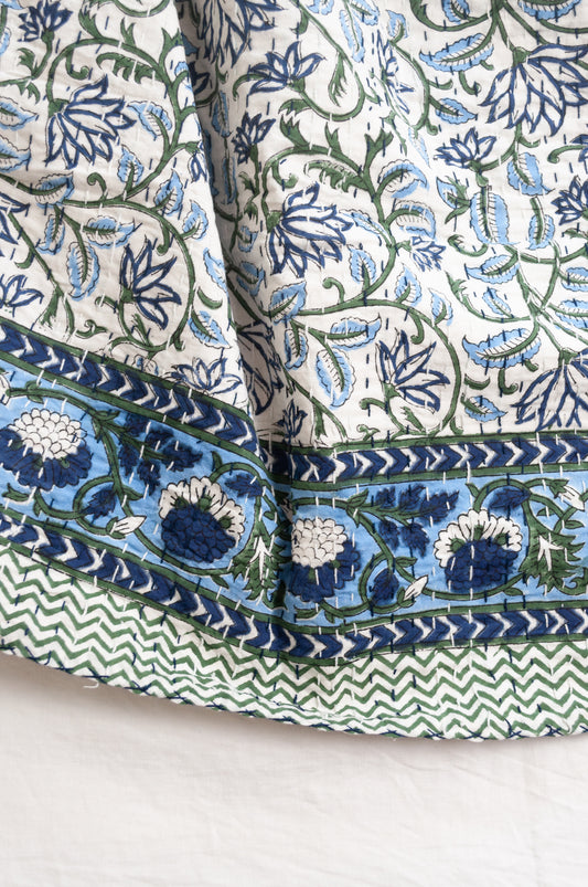 Kantha quilt blockprint pure cotton in floral blue and green on white pattern.