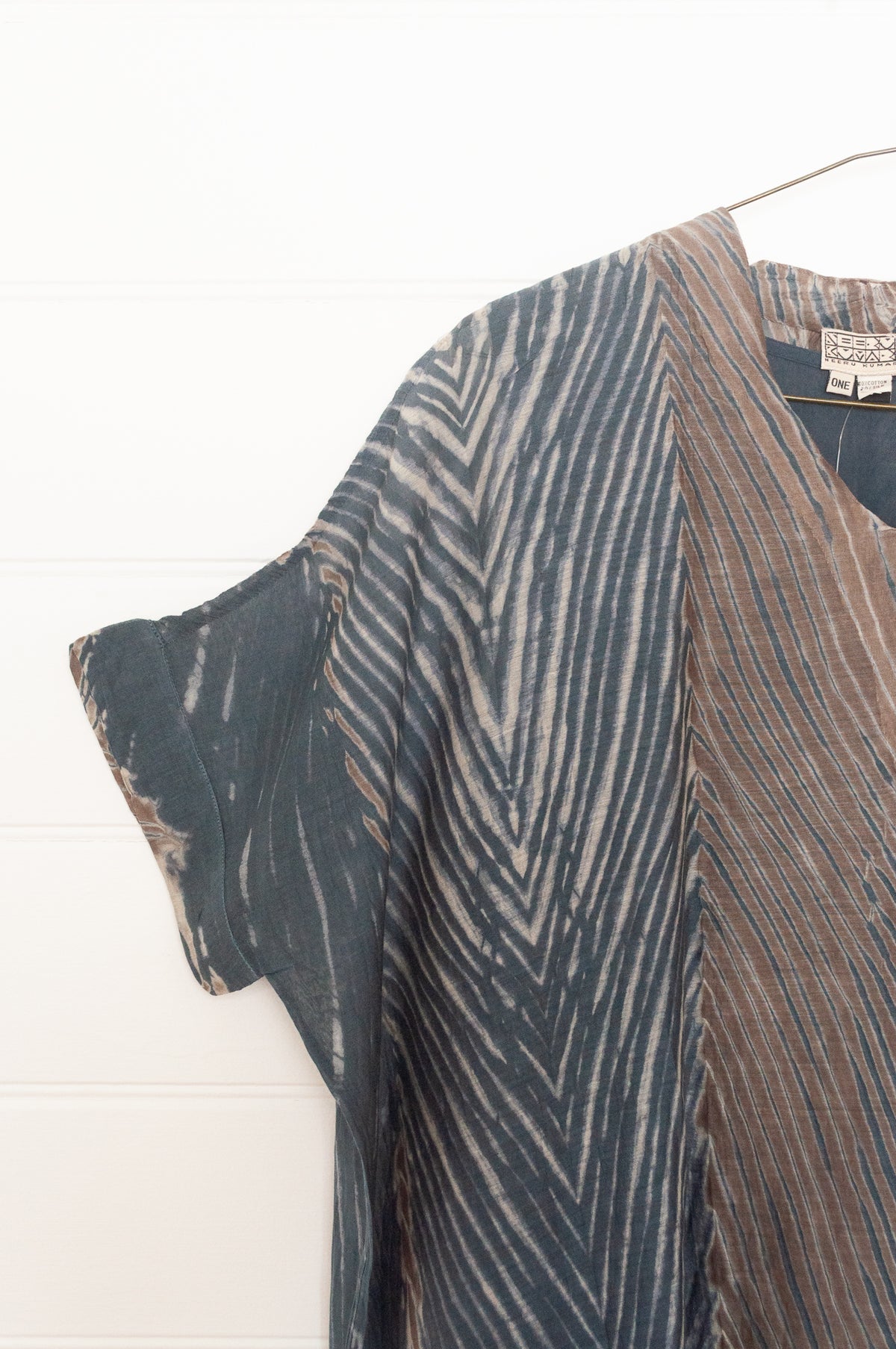 Neeru Kumar cotton silk shibori v-neck short sleeved top in greens and greys.