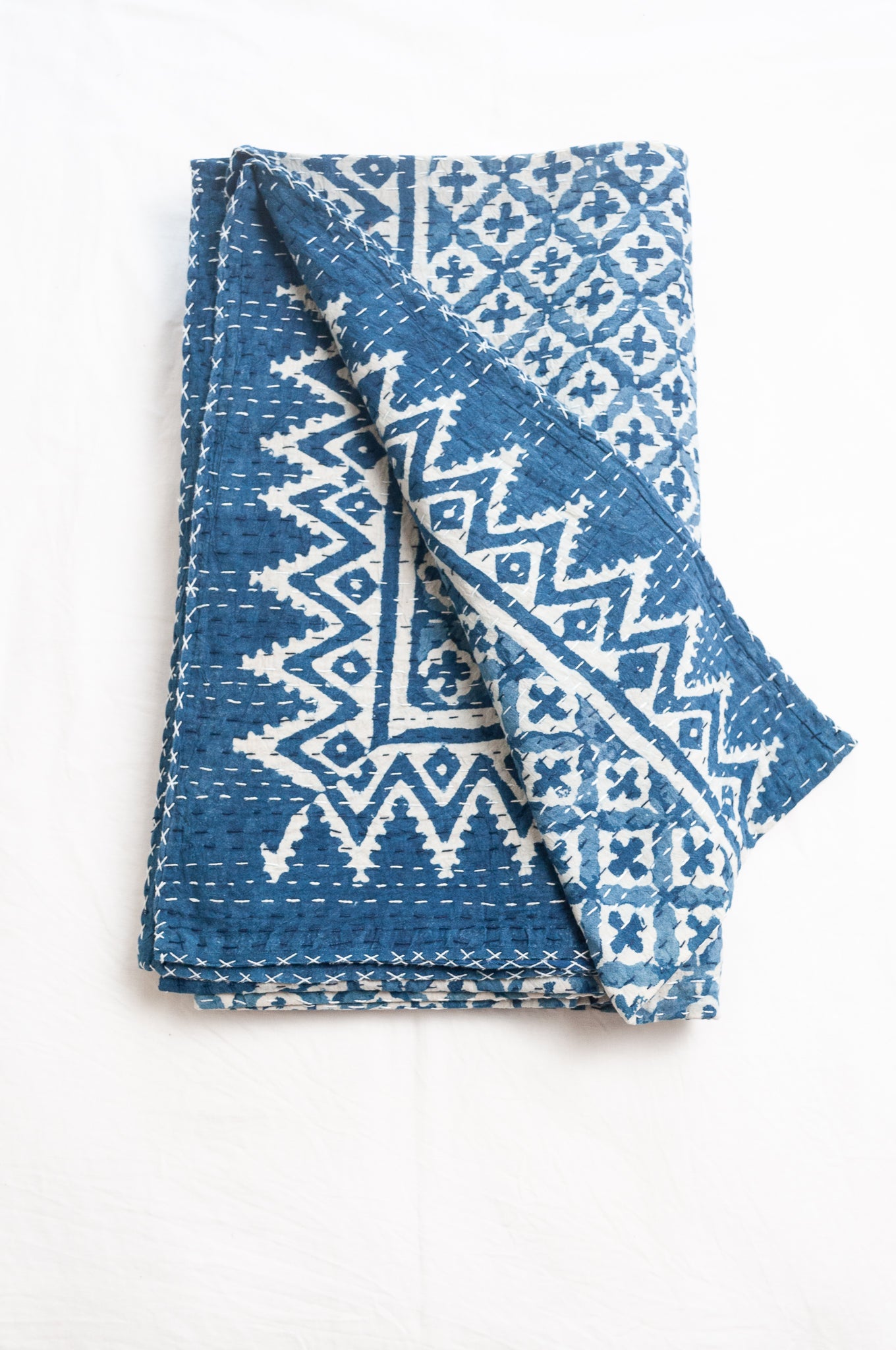 Kantha quilt indigo blockprint pure cotton in dot and cross pattern.
