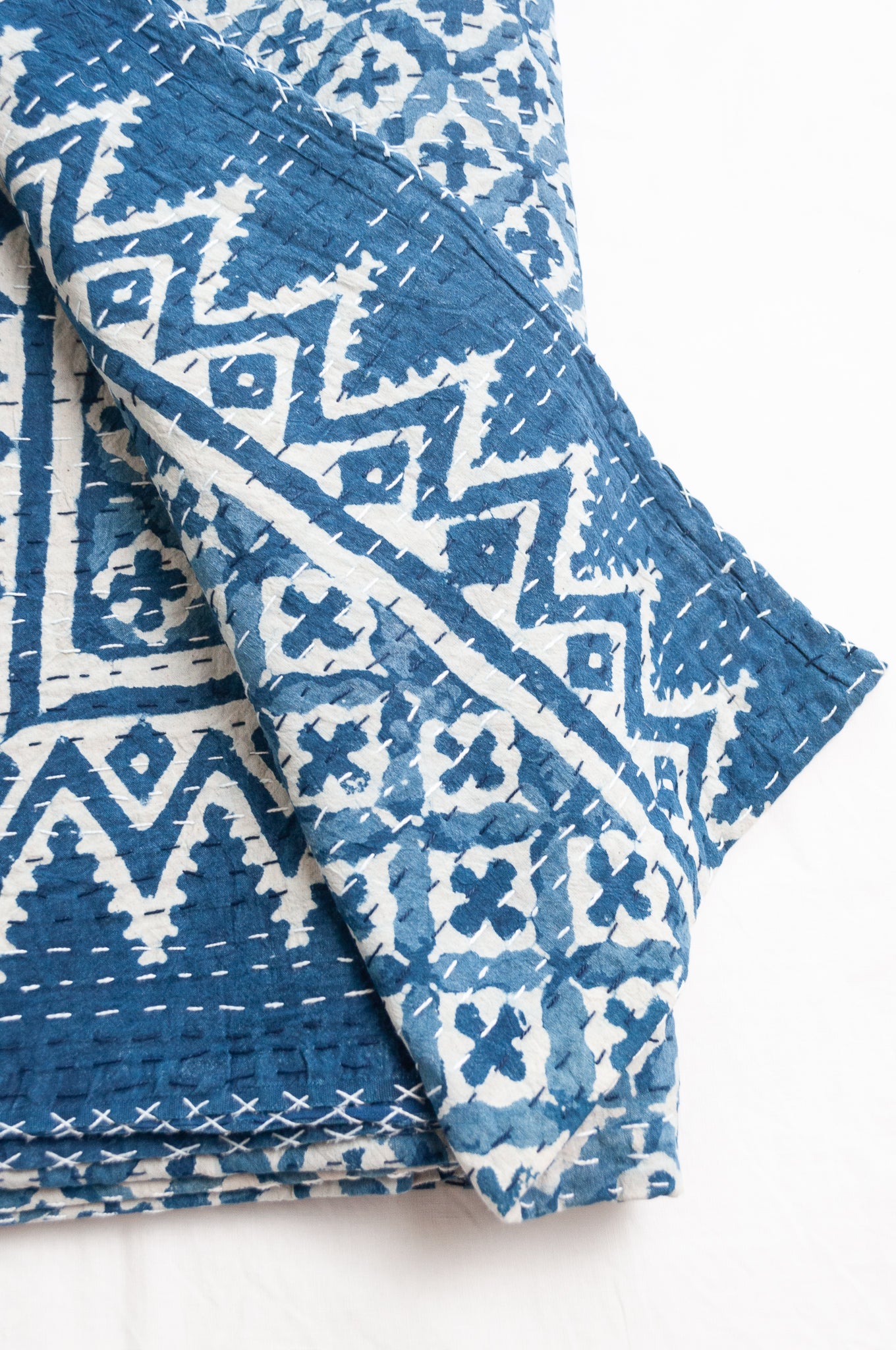 Kantha quilt indigo blockprint pure cotton in dot and cross pattern.
