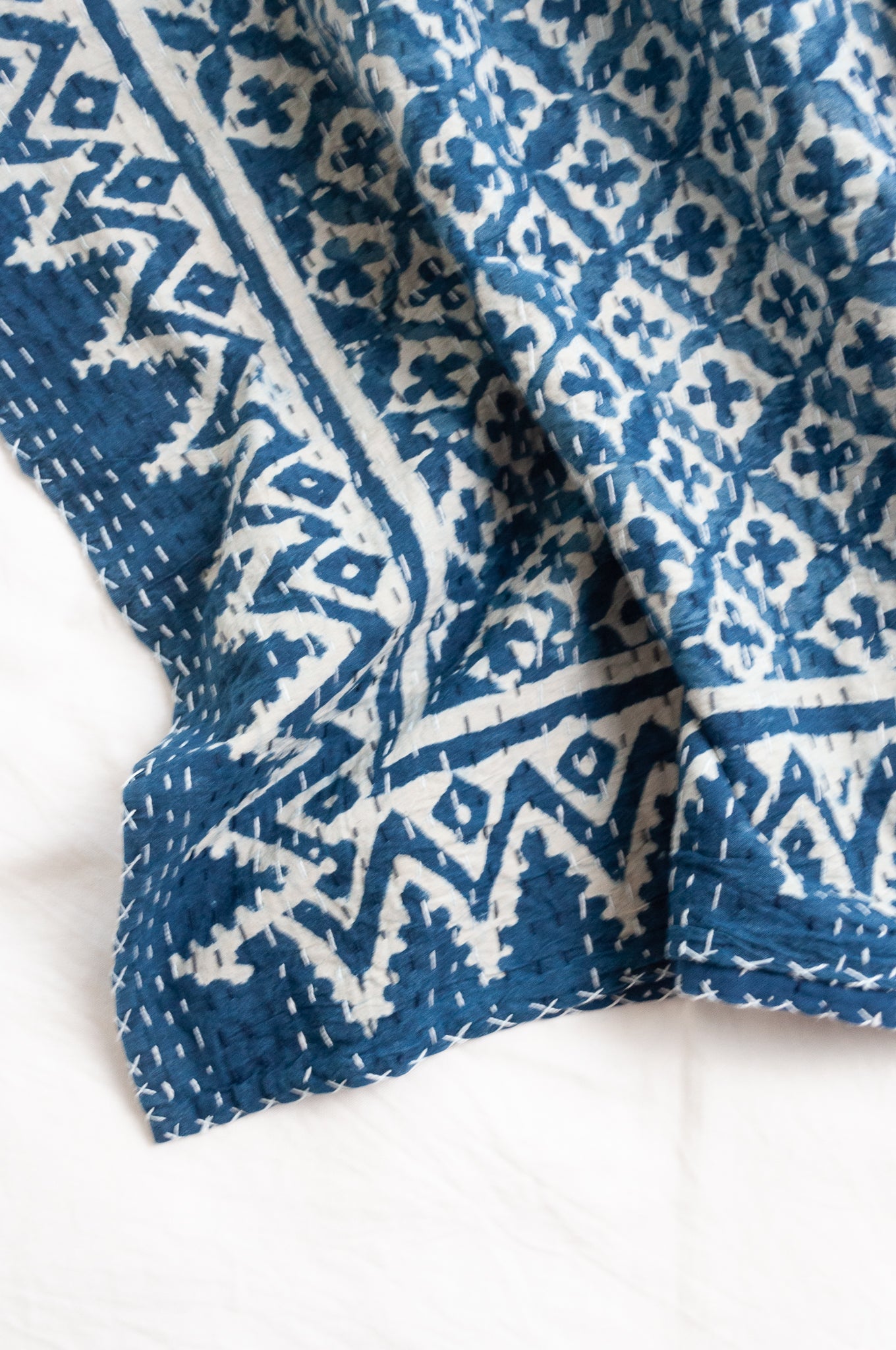 Kantha quilt indigo blockprint pure cotton in dot and cross pattern.