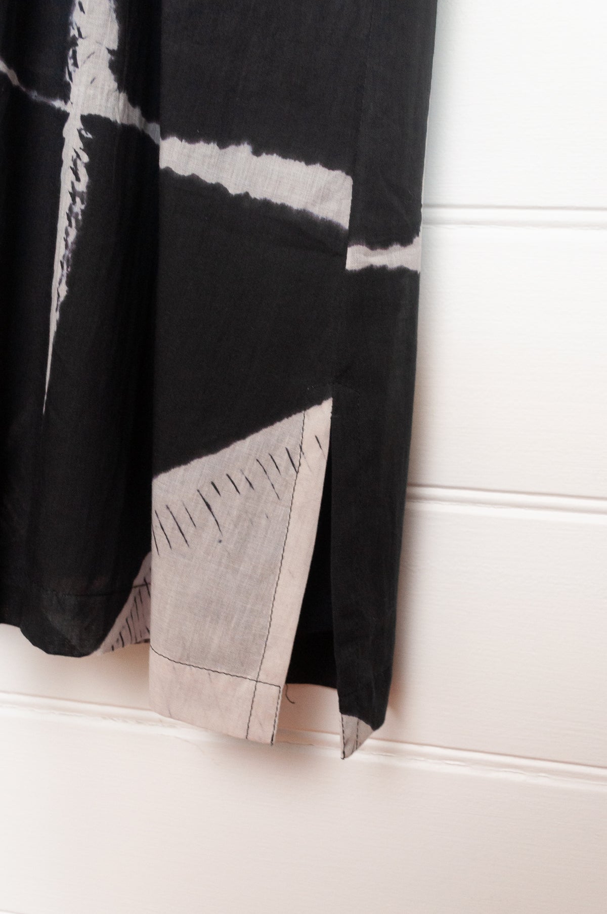 Neeru Kumar fine cotton pintucked cap sleeved dress in black and white shibori design.