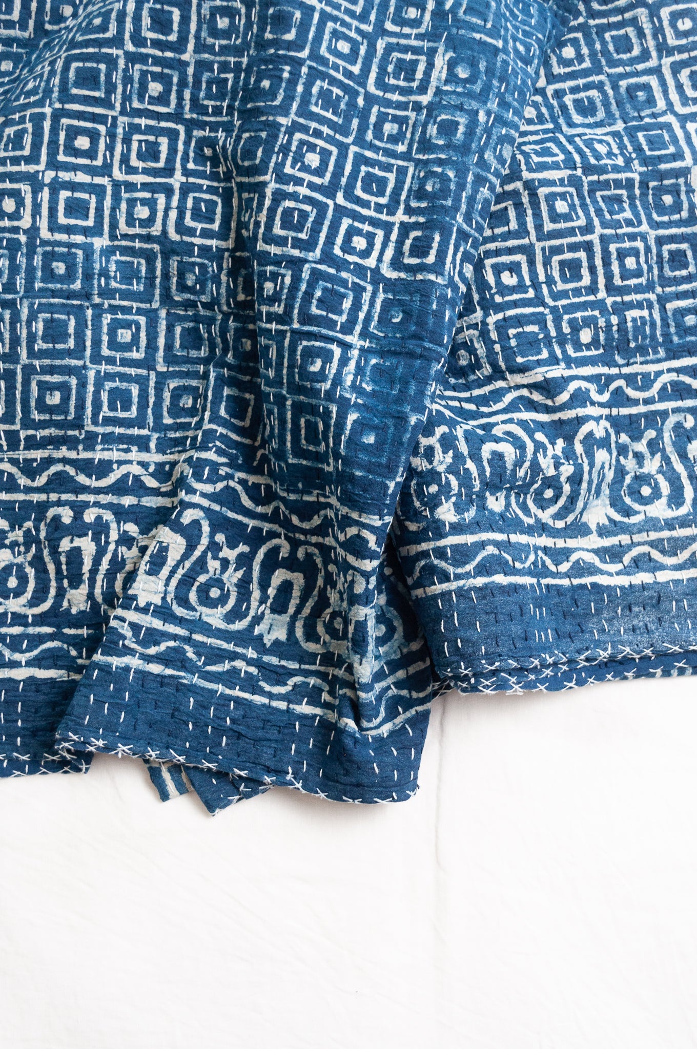 Indigo blue and white pure cotton kantha stitch bed quilt with squares design.